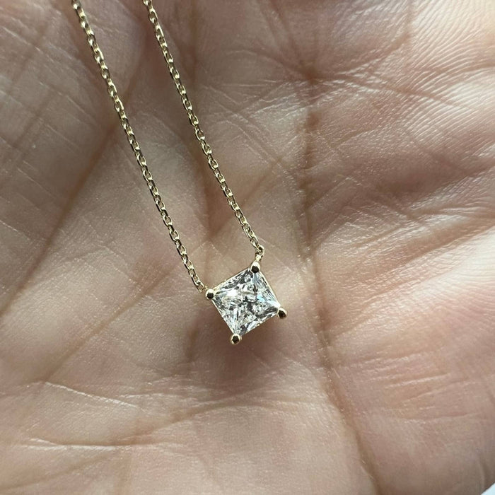 	princess cut diamond necklace yellow gold