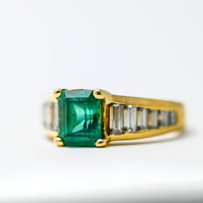 Emerald Ring in 18k Yellow Gold with Baguette Cut Diamond Accents