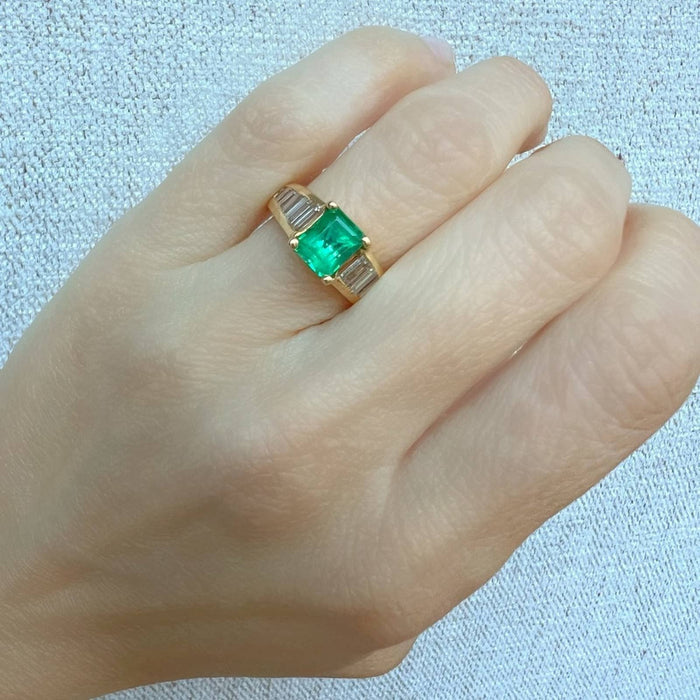 Emerald Ring in 18k Yellow Gold with Baguette Cut Diamond Accents