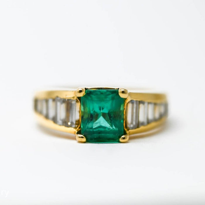 Emerald Ring in 18k Yellow Gold with Baguette Cut Diamond Accents