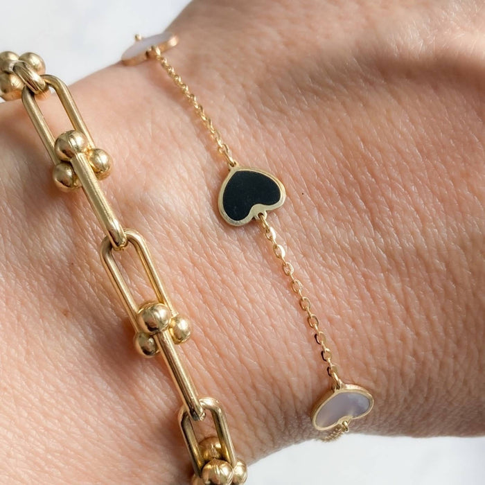 14K Yellow Gold Mother Of Pearl and Onyx Heart Station Bracelet