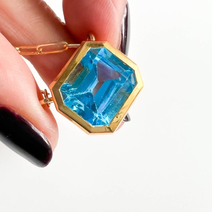 14K Yellow Gold Swiss Blue Topaz Emerald Cut East West Pendant Necklace