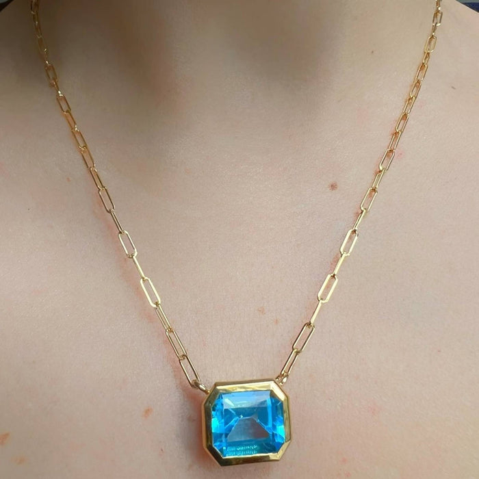 14K Yellow Gold Swiss Blue Topaz Emerald Cut East West Pendant Necklace