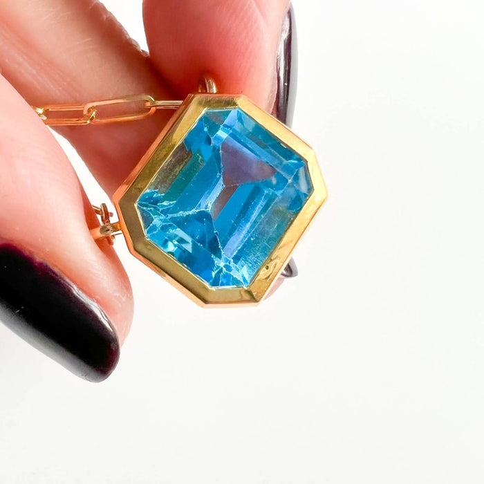 14K Yellow Gold Swiss Blue Topaz Emerald Cut East West Pendant Necklace