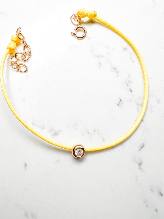 Silk bracelet with 14K Gold Diamond Charms