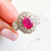 Ruby and Diamond Halo Engagement Ring in 14K White Gold