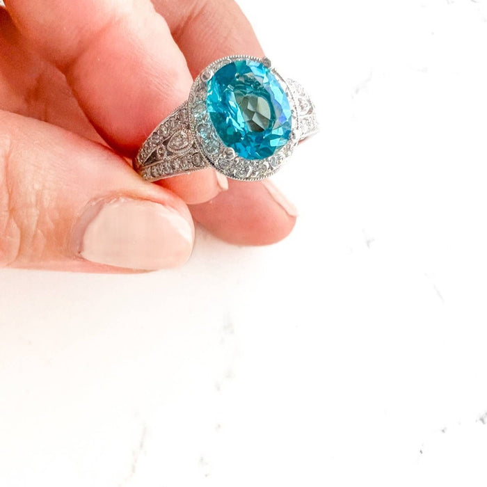 18k White Gold Oval Blue Topaz and Diamond Halo Cocktail Ring