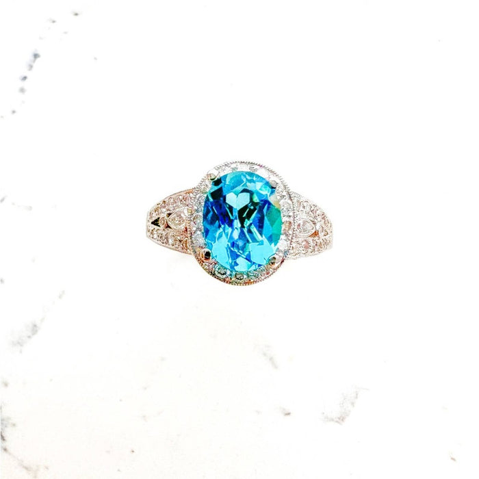 18k White Gold Oval Blue Topaz and Diamond Halo Cocktail Ring