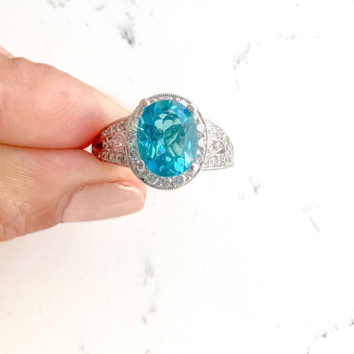 18k White Gold Oval Blue Topaz and Diamond Halo Cocktail Ring